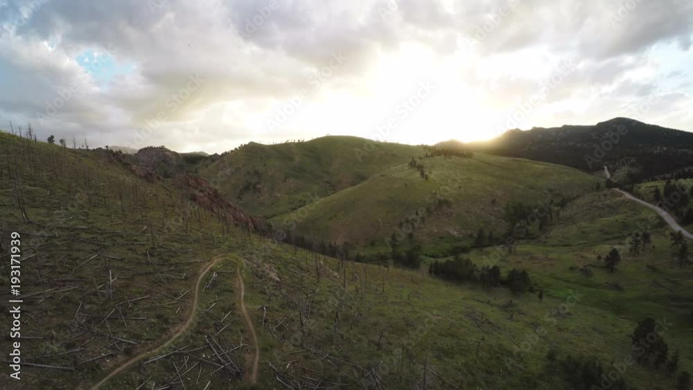 Aerial, biking trail in scenic hillside Aerial, biking trail in scenic hillside