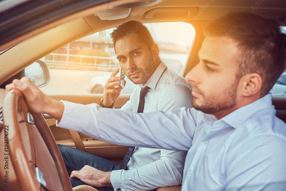 A handsome businessman in luxury car A handsome businessman in luxury car