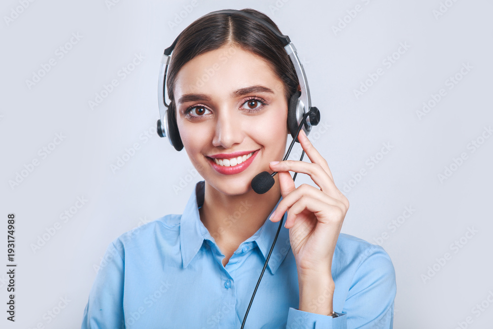 Woman customer service worker, call center smiling operator with phone headset Woman customer service worker, call center smiling operator with phone headset