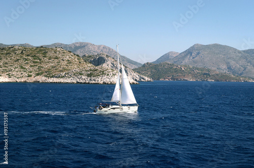 Sailboat sailing in Mediterranean sea.