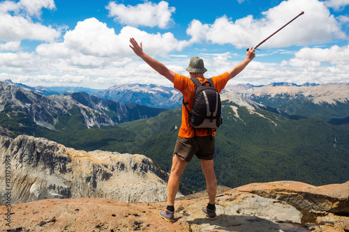 Elderly tourist climbed to top of cliff