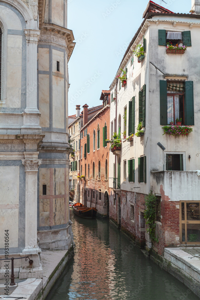 View of one of the many canals of Venice, Italy. Venice is a popular tourist destination of Europe.