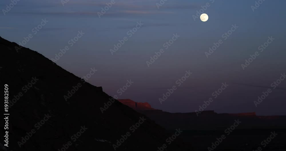 Mountain biker rides down hill, slow motion beauty shot Mountain biker rides down hill, slow motion beauty shot