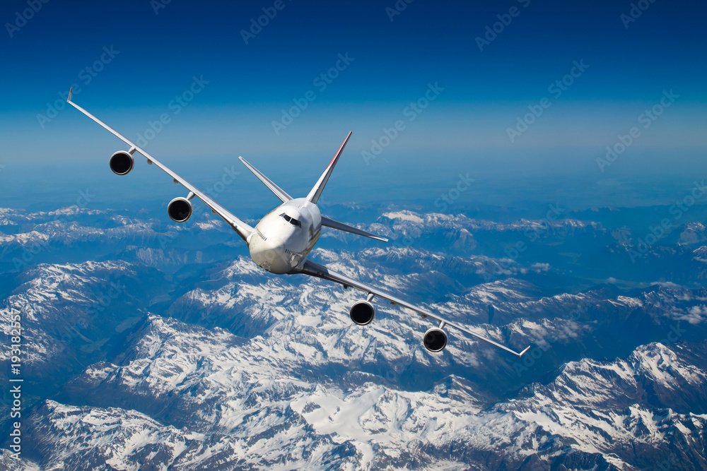 Naklejka premium Flying over the Alps