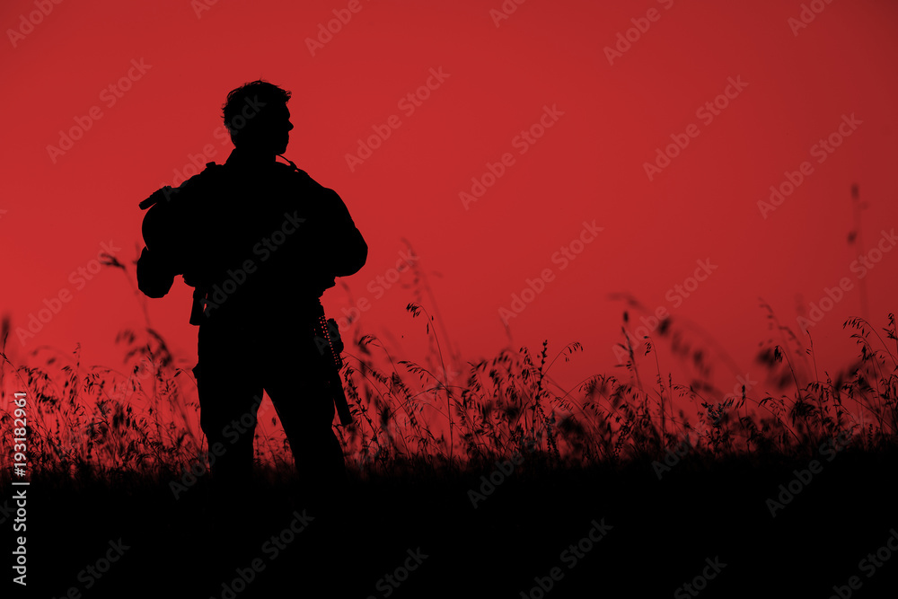 military soldier with weapons at sunset. shot, holding gun, colorful sky. military concept. military soldier with weapons at sunset. shot, holding gun, colorful sky. military concept.