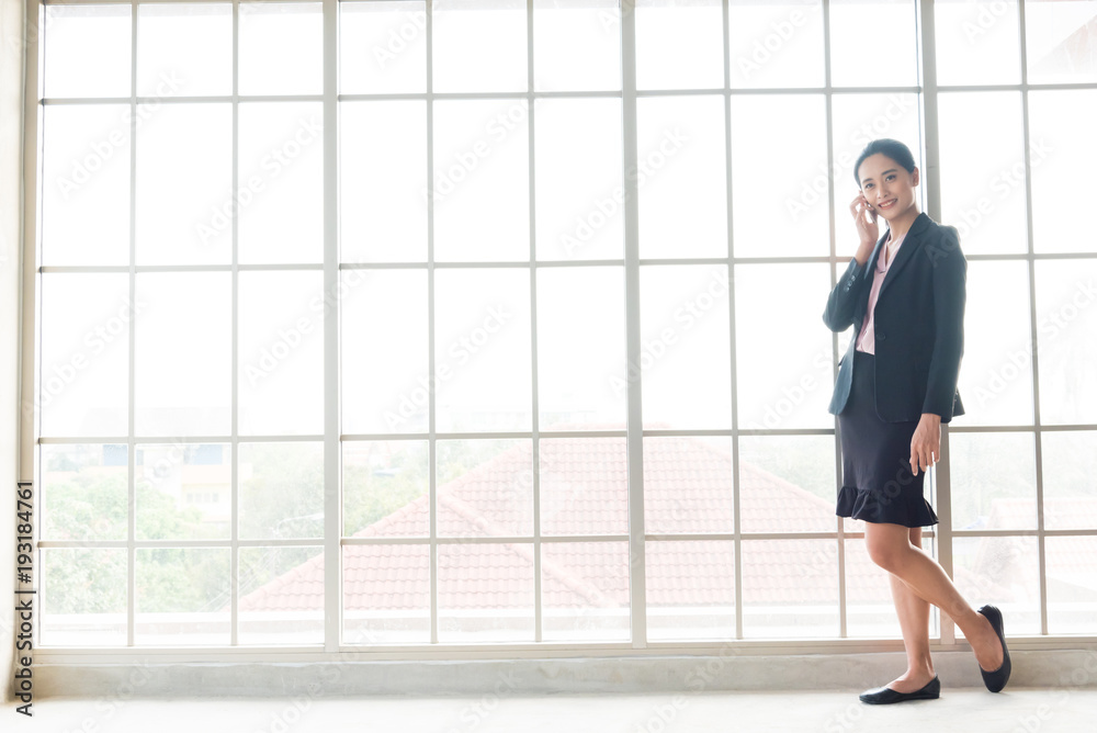 business woman using a smart phone business woman using a smart phone