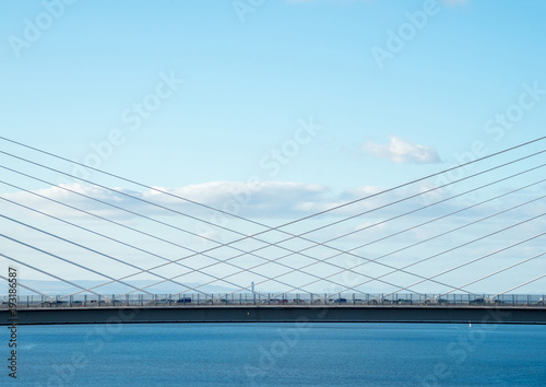 The new Queensferry Crossing Bridge, viewed from the west footpath of the old Forth Road Bridge, showing the cable-stayed construction..