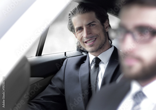 businessman sitting in his car. © ASDF