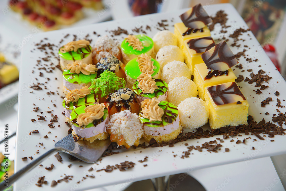cakes on dessert trays cakes on dessert trays