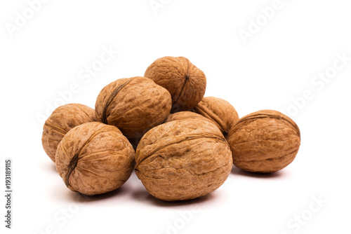 Group of walnuts on white. Healthy organic food concept.
