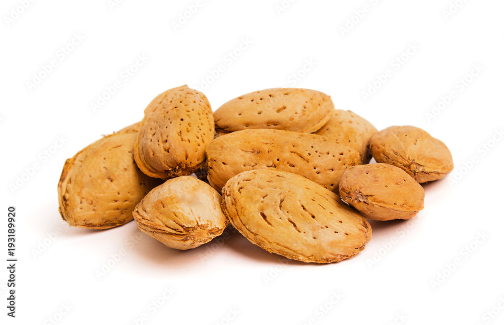 Macro view of shelled almond. Almonds in their shells. Macro view of shelled almond. Almonds in their shells.