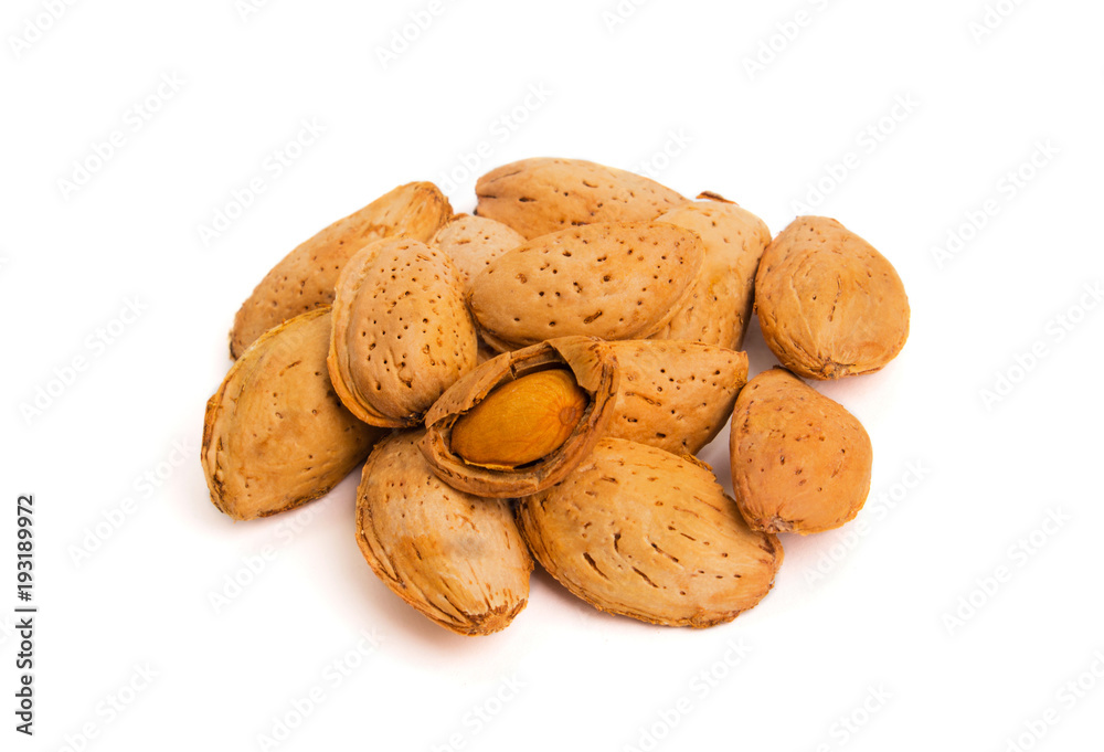 Macro view of shelled almond. Almonds in their shells. Macro view of shelled almond. Almonds in their shells.