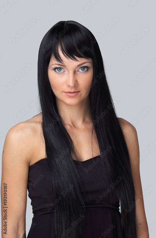 Beautiful woman face with clean fresh skin - isolated on gray Beautiful woman face with clean fresh skin - isolated on gray