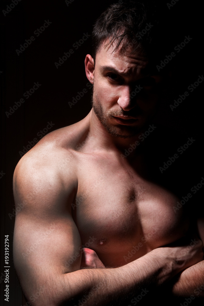 Mysterious handsome man with sneaky look. man with beard smiling. sexy guy in a dark jacket with confident face. Sexy and smart man with beautiful eyes. businessman on a dark romantic background. Mysterious handsome man with sneaky look. man with beard smiling. sexy guy in a dark jacket with confident face. Sexy and smart man with beautiful eyes. businessman on a dark romantic background.