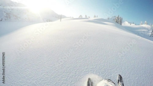 Snowmobiling in Eagle Pass mountain landscape, POV