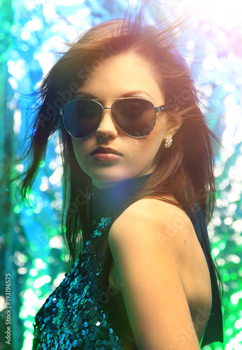 closeup. stylish young woman in sunglasses © ASDF