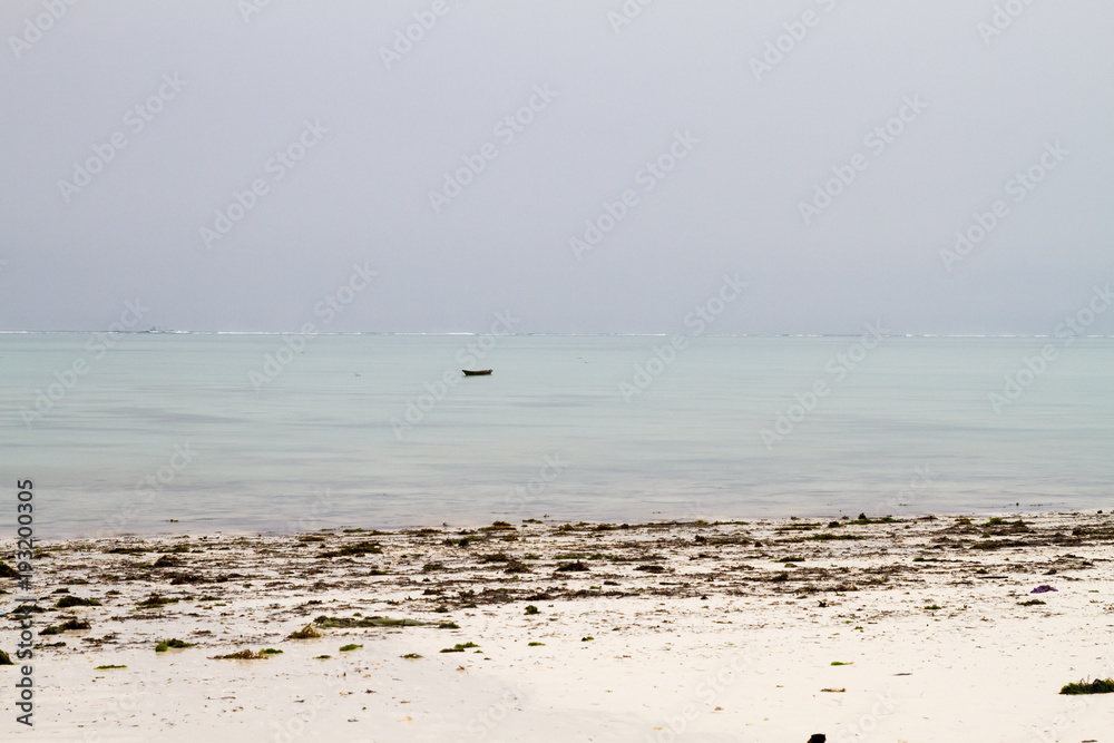 Landscape with sparkling blue water off the white beaches of the Indian Ocean spice island of Zanzibar (Unguja), Tanzania Landscape with sparkling blue water off the white beaches of the Indian Ocean spice island of Zanzibar (Unguja), Tanzania