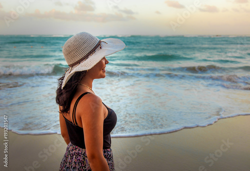Latina woman on holiday at the beach 2