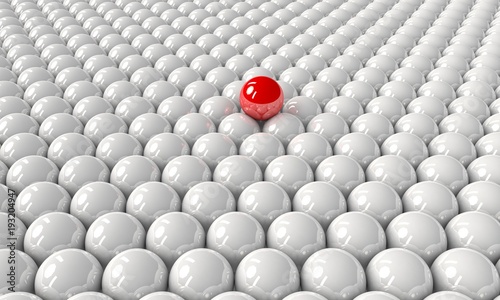 Red sphere on top of the other white spheres; standing out, leader or success concept