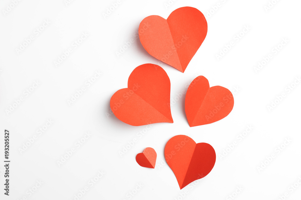 Red paper hearts isolated on white