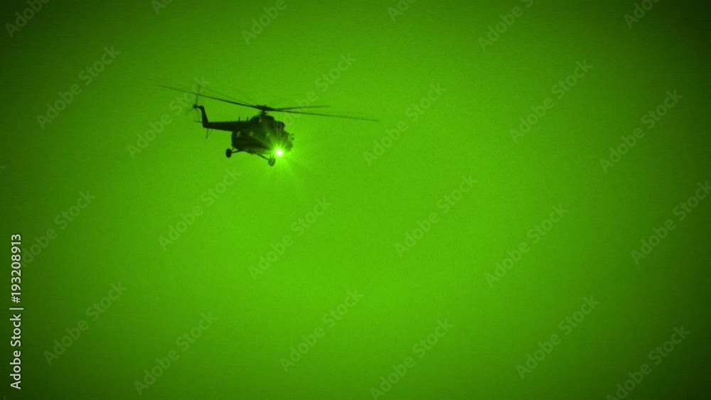Military Helicopter Fly by in Night Vision