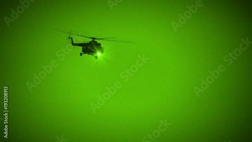 Military Helicopter Fly by in Night Vision