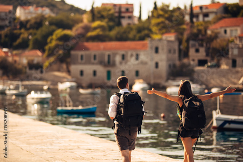 Young freelancing photographers enjoying traveling and backpacking.Photojournalism.Documentary travel photos.Lightweight travel photography gear,backpack and equipment.Low budget traveling experience