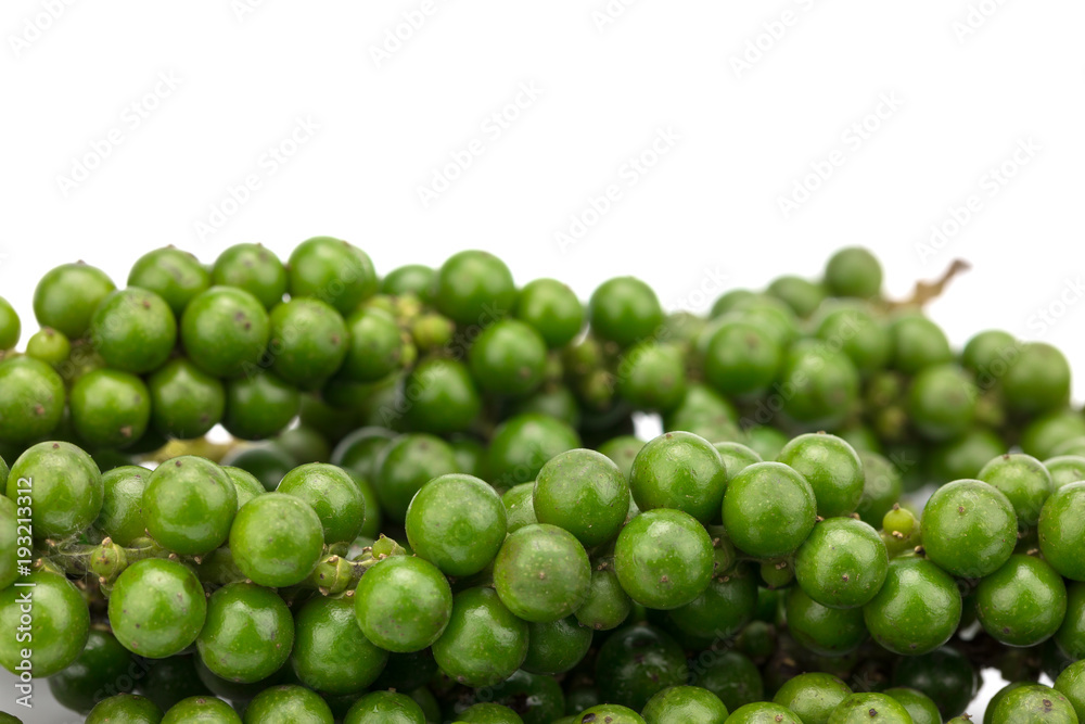 Fresh green pepper on a white background isolated spices for cooking Fresh green pepper on a white background isolated spices for cooking