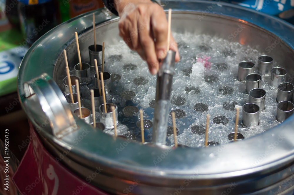 Machine tank made ice cream stick with sparkling water in street food market  thailand