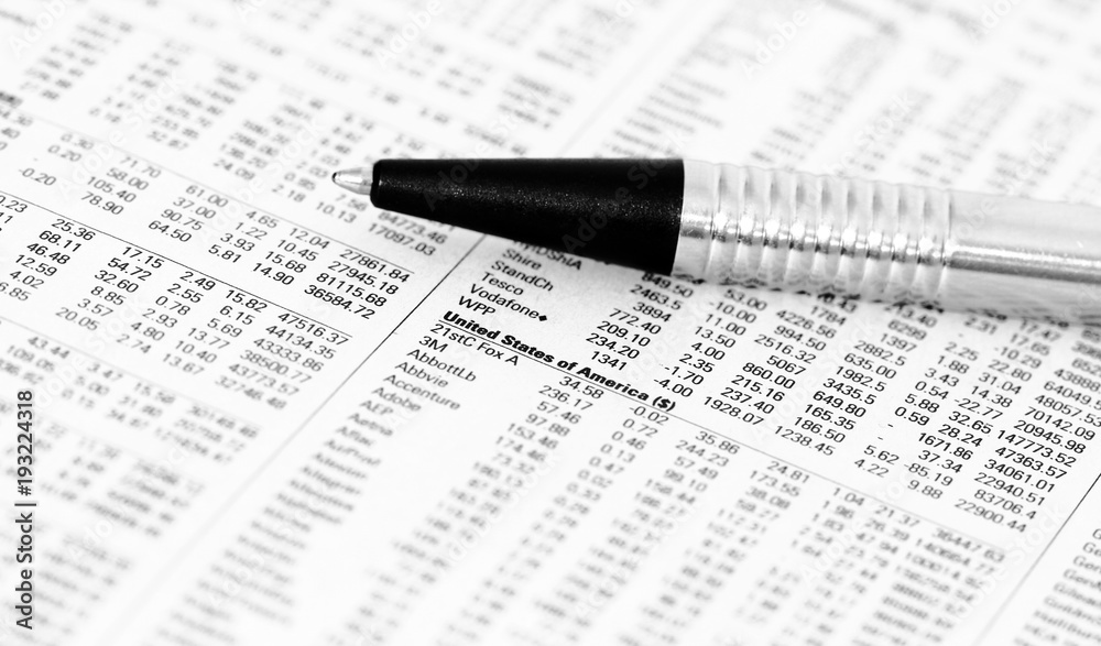 Pen on a financial paper Pen on a financial paper