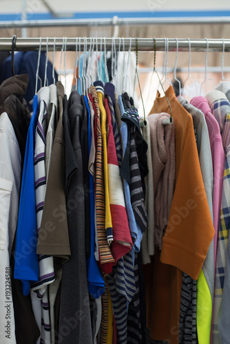 shirts hanging on a hanger.Colorful T Shirt
