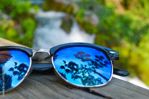 Sunglasses with Cueva del agua at the background in Tamul, Huasteca Potosina © JoseLuis