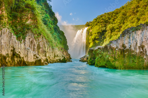 Turquoise river and Tamul waterfall at Huasteca Potosina, Mexico photo