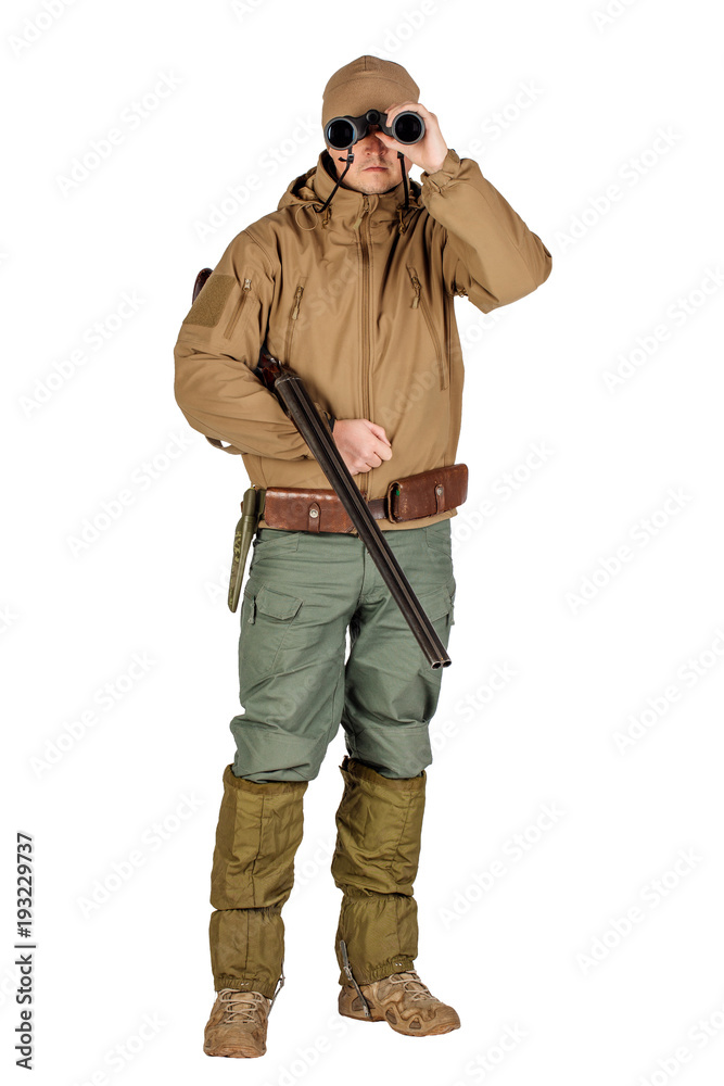 Full length portrait of a male hunter looking through binoculars Isolated on white background. hunting and people concept. Full length portrait of a male hunter looking through binoculars Isolated on white background. hunting and people concept.