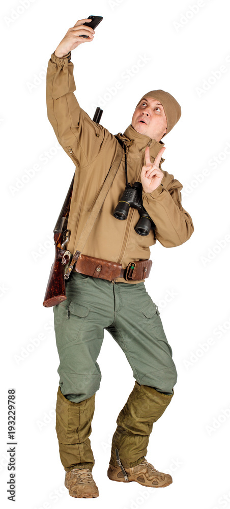 Fototapeta premium Full length portrait of a male hunter with double barreled shotgun Isolated on white background. hunting and people concept.