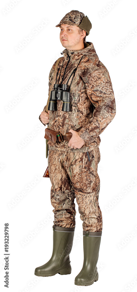 Full length portrait of a male hunter with double barreled shotgun Isolated on white background. hunting and people concept. Full length portrait of a male hunter with double barreled shotgun Isolated on white background. hunting and people concept.