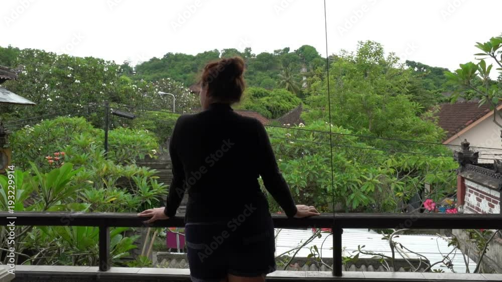 beautiful brunette woman on the terrace with wonderful green mountains view beautiful brunette woman on the terrace with wonderful green mountains view