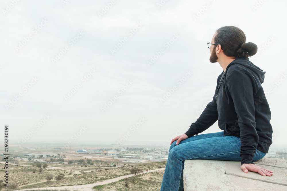 Male tourist admires the view