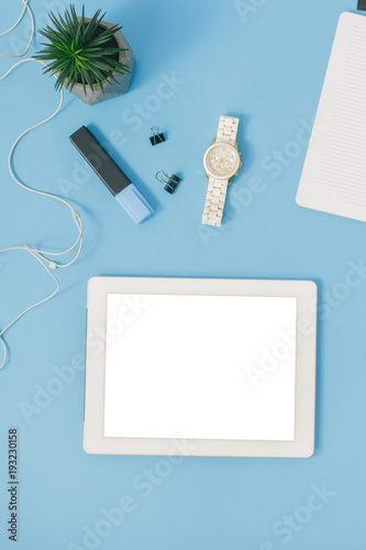 Office workspace. Office table white tablet blank screen. Flat lay