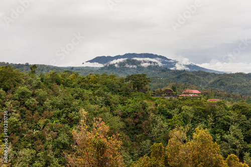 Panorama view on forests near Batur volcano, Kintamani. Winter rainy and cloudy season. Bali, Indonesia.