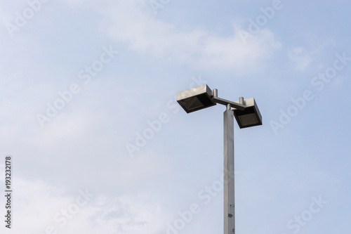 street light electricity front view isolated with blue sky., with copy space