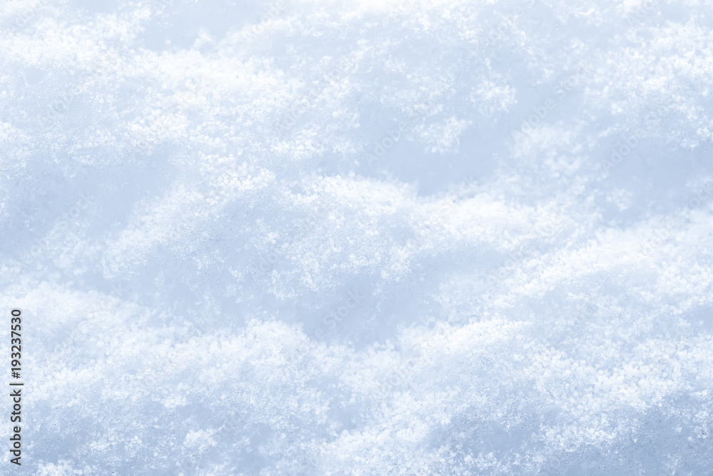 Snow surface texture background. Crystals and snowflakes. winter natural background.
