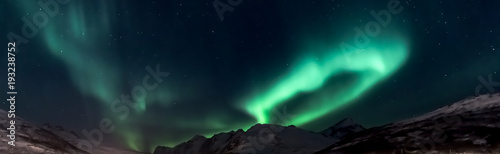 Aurora Borealis (northern lights) above mountains Kaldfjord  - Kvaloya, north Norway © Marcin