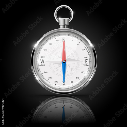 Compass. Round gauge with chrome frame with reflection