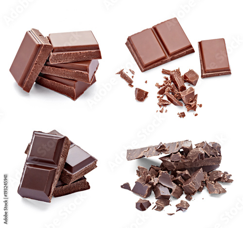 close up of chocolate pieces on wooden background