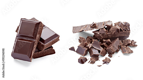 close up of chocolate pieces on wooden background