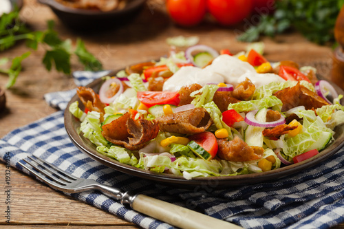 Gyros, kebeb. Salad with mutton and vegetables.