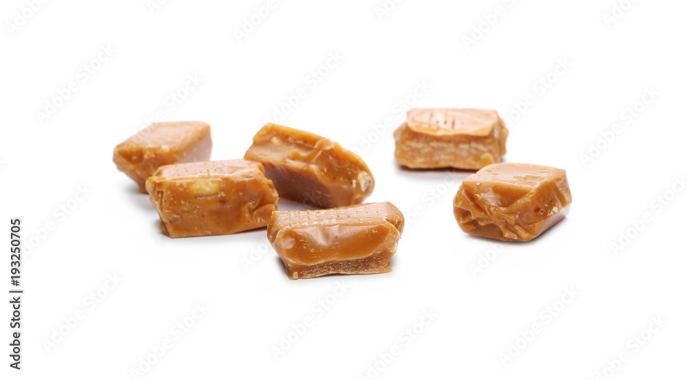 Caramels, pieces isolated on white background Caramels, pieces isolated on white background