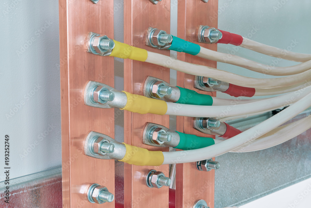 Electric bus bars connected to it by wires or cables. The cables are