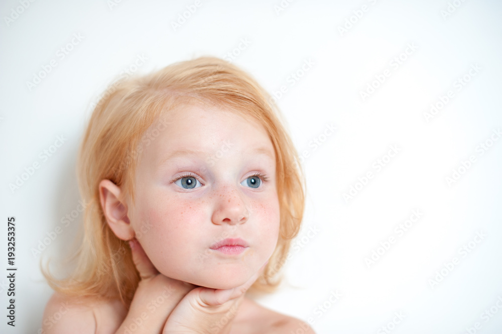A girl looks out her lips with a pipe A girl looks out her lips with a pipe